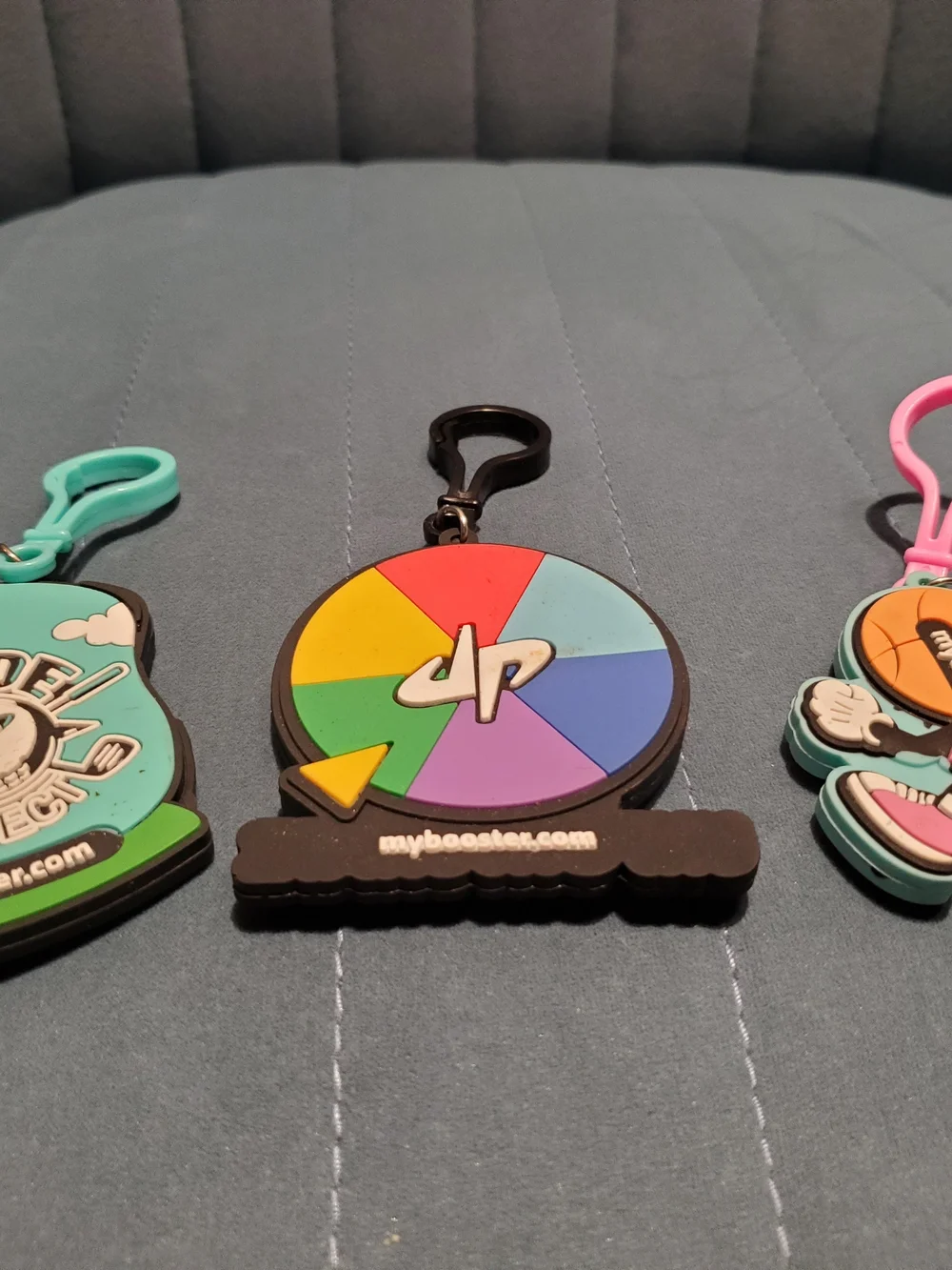 Wheel Unfortunate Rubber Keychain - Multicolor Wheel Design
